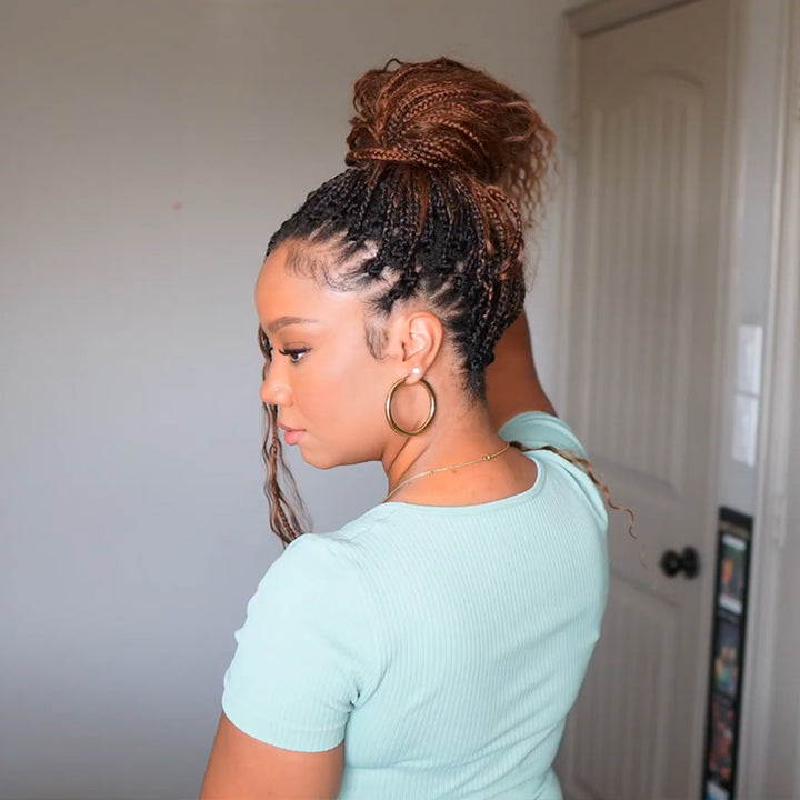 human knotless bohemian braids with high bun