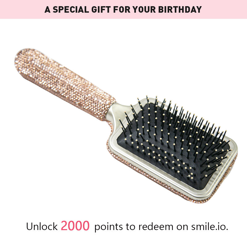 Long-handled_air_cushion_comb_for_your_birthday