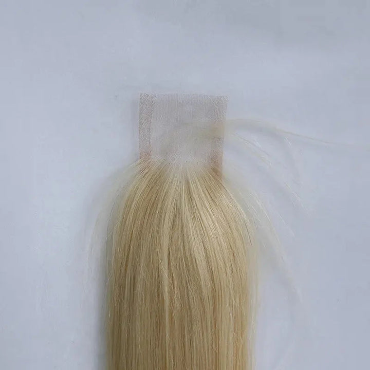 Close-up of 613 Blonde closure lace and roots
