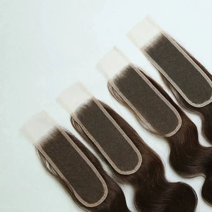 Close-up of Chocolate Brown Body Wave closure lace bases