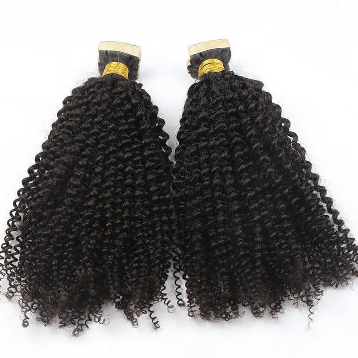 Afro Kinky Curly tape-in extensions: Two upright wefts showing compact coils