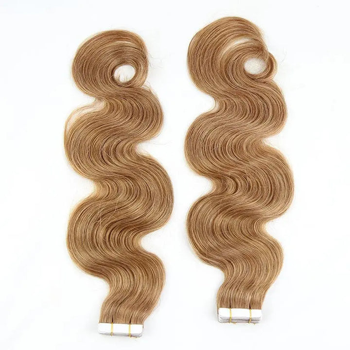 Body Wave tape-in extensions in #30 color: Full view of warm-colored waves and the ends