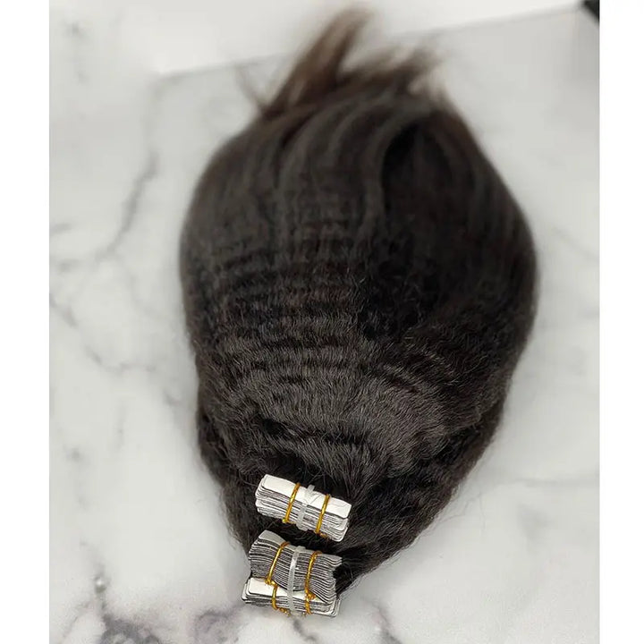 Kinky Straight tape-in extensions: Folded hair showing the textured finish