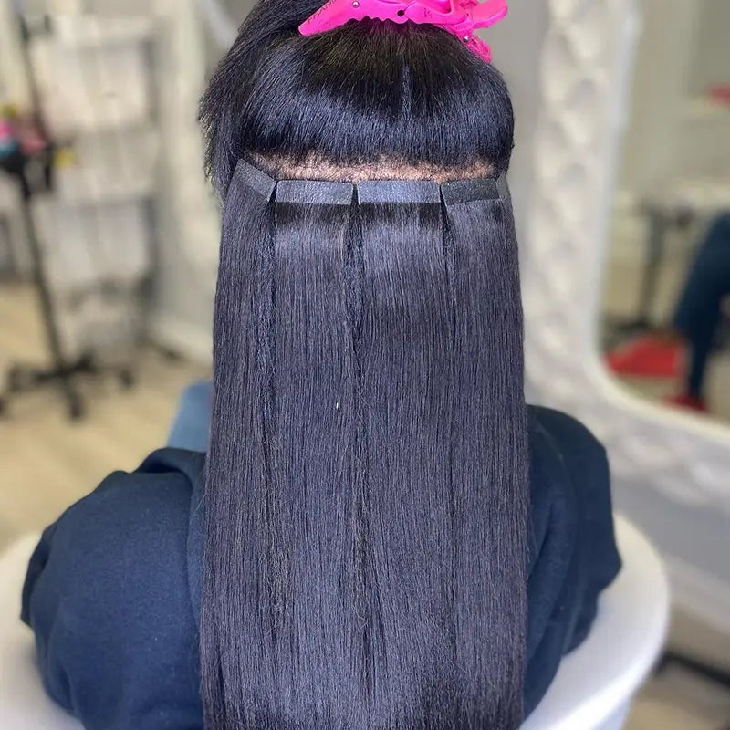 Silky Straight tape-in extensions: Back view showing straight tape-in placement and sectioning