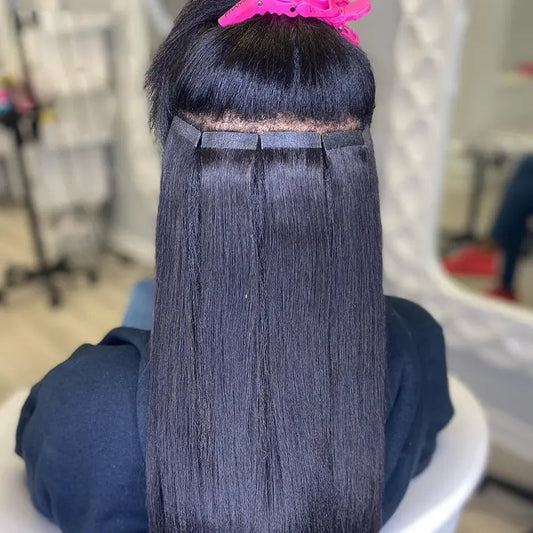 Silky Straight tape-in extensions: Back view showing straight tape-in placement and sectioning